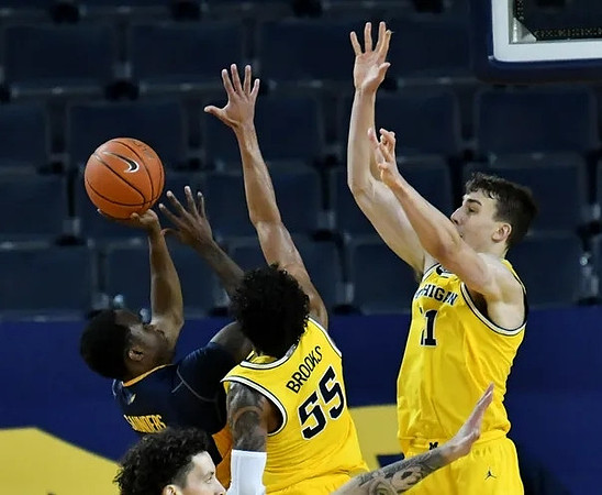 Eli Brooks (55) and Franz Wagner (21)