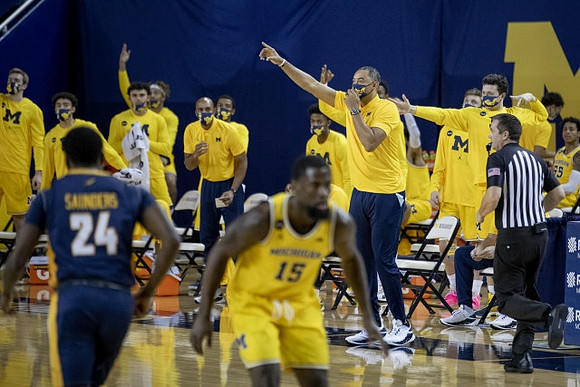 Chaundee Brown Jr. (15) and Juwan Howard