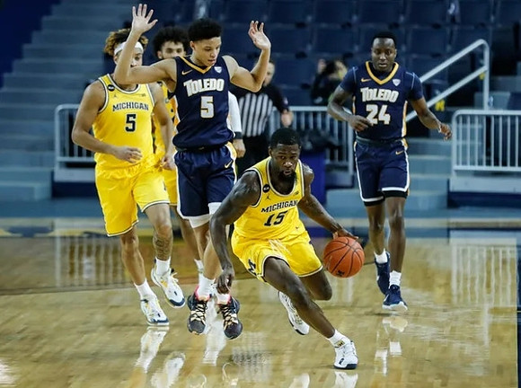 Terrance Williams II (5) and Chaundee Brown Jr. (15)