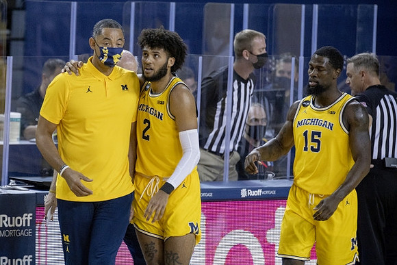 Juwan Howard, Isaiah Livers (2), and Chaundee Brown Jr. (15)