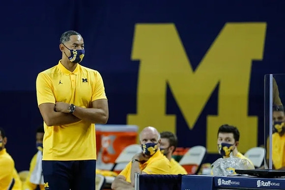 Juwan Howard, Phil Martelli, and C.J. Baird (24)