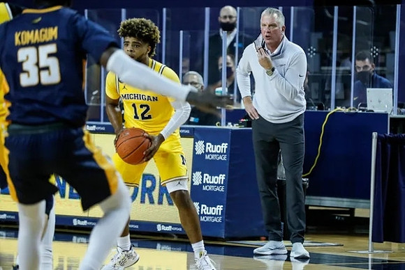 Mike Smith (12) and Toledo Head Coach Tod Kowalczyk
