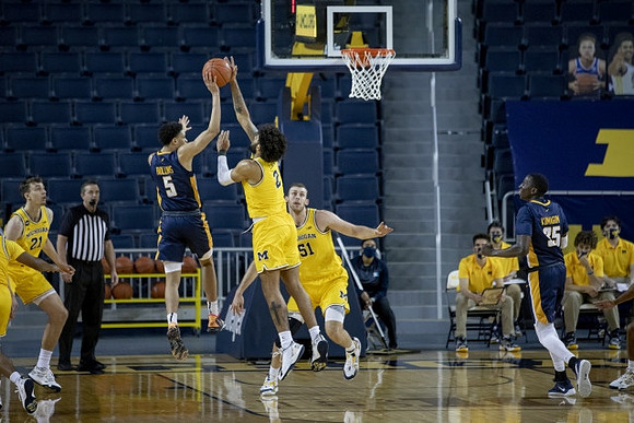 Franz Wagner (21), Isaiah Livers (2), and Austin Davis (51)