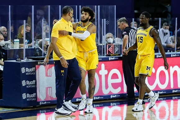Juwan Howard, Isaiah Livers (2), and Chaundee Brown Jr. (15)