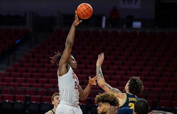 Franz Wagner (21), Mike Smith (12), and Brandon Johns Jr. (23)