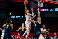 Isaiah Livers (2), Franz Wagner (21), Hunter Dickinson (1), and Mike Smith (12)