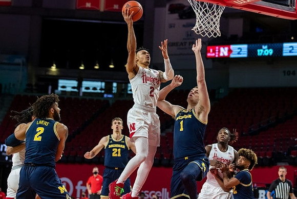 Isaiah Livers (2), Franz Wagner (21), Hunter Dickinson (1), and Mike Smith (12)