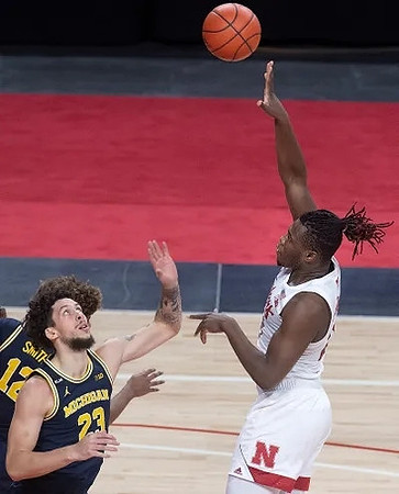 Mike Smith (12) and Brandon Johns Jr. (23)