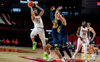 Eli Brooks (55), Hunter Dickinson (1), and Franz Wagner (21)