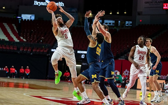 Eli Brooks (55), Hunter Dickinson (1), and Franz Wagner (21)