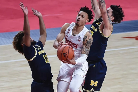 Mike Smith (12) and Brandon Johns Jr. (23)