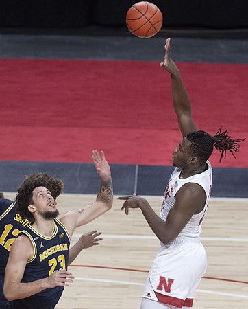 Mike Smith (12) and Brandon Johns Jr. (23)