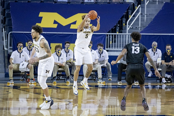 Brandon Johns Jr. (23) and Terrance Williams II (5)
