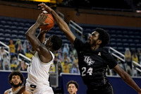 Isaiah Livers (2), Chaundee Brown Jr. (15), and Brandon Johns Jr. (23)