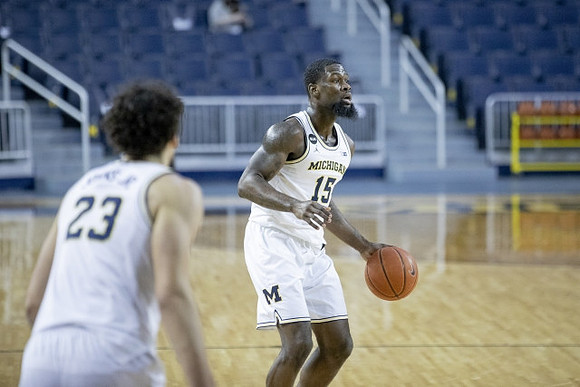 Brandon Johns Jr. (23) and Chaundee Brown Jr. (15)