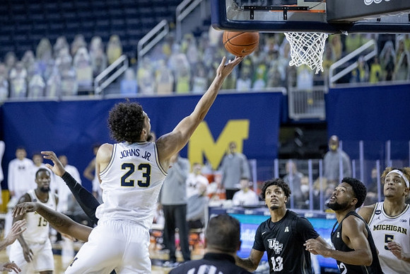 Brandon Johns Jr. (23), Chaundee Brown Jr. (15), and Terrance Williams II (5)