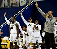 Chaundee Brown Jr. (15), Jace Howard (25), Adrien Nunez (0), Rico Ozuna-Harrison (14), and Juwan Howard