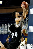 Brandon Johns Jr. (23) and Eli Brooks (55)