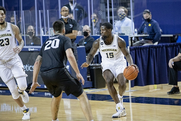Chaundee Brown Jr. (15) and Brandon Johns Jr. (23)