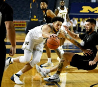 Brandon Johns Jr. (23) and Chaundee Brown Jr. (15)