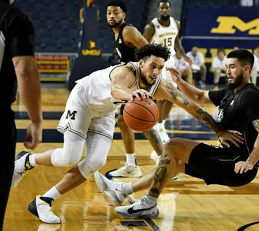 Brandon Johns Jr. (23) and Chaundee Brown Jr. (15)