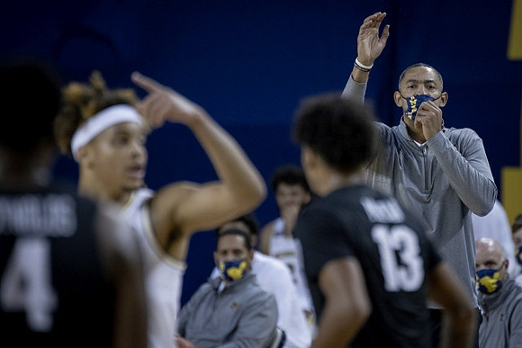 Terrance Williams II (5) and Juwan Howard