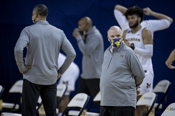 Juwan Howard, Saddi Washington, Phil Martelli, and Isaiah Livers (2)