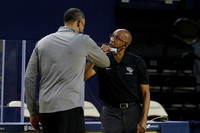 Juwan Howard and Central Florida Head Coach Johnny Dawkins