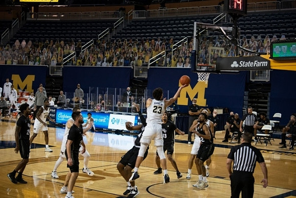 Brandon Johns Jr. (23) and Chaundee Brown Jr. (15)