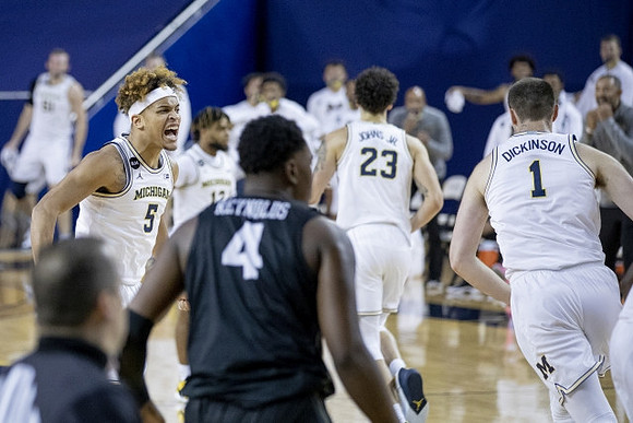 Terrance Williams II (5), Brandon Johns Jr. (23), and Hunter Dickinson (1)