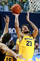 Chaundee Brown Jr. (15) and Brandon Johns Jr. (23)