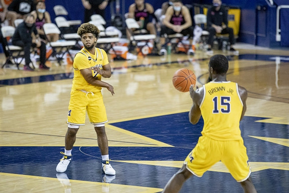 Mike Smith (12) and Chaundee Brown Jr. (15)