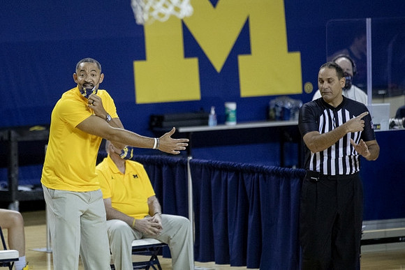 Juwan Howard and Phil Martelli