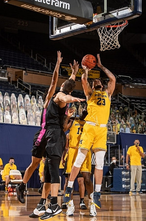 Brandon Johns Jr. (23) and Chaundee Brown Jr. (15)