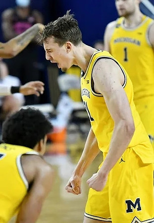 Eli Brooks (55), Franz Wagner (21), and Hunter Dickinson (1)