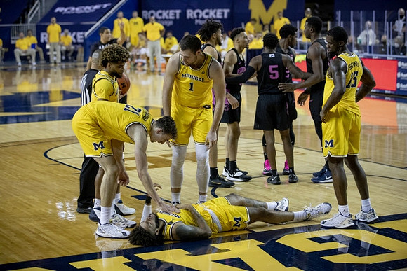 Isaiah Livers (2), Franz Wagner (21), Mike Smith (12), Hunter Dickinson (1), and Chaundee Brown Jr. (15)