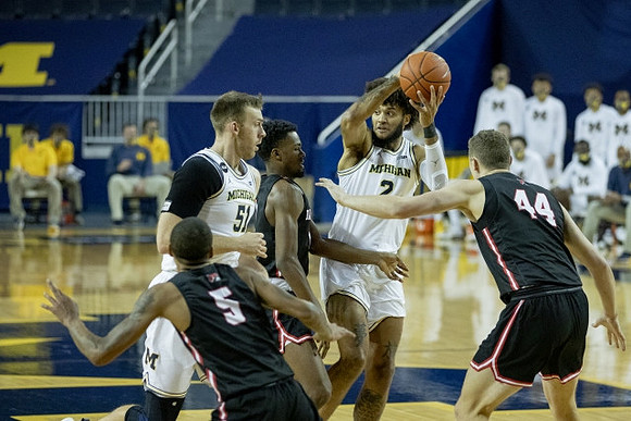 Austin Davis (51) and Isaiah Livers (2)