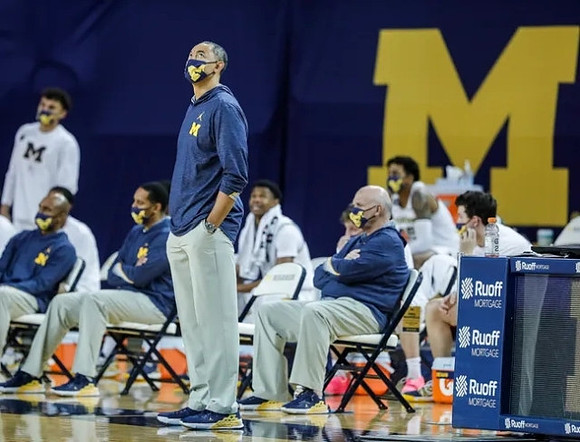 Juwan Howard and Phil Martelli
