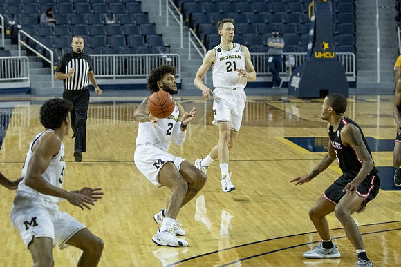 Eli Brooks (55), Isaiah Livers (2), and Franz Wagner (21)