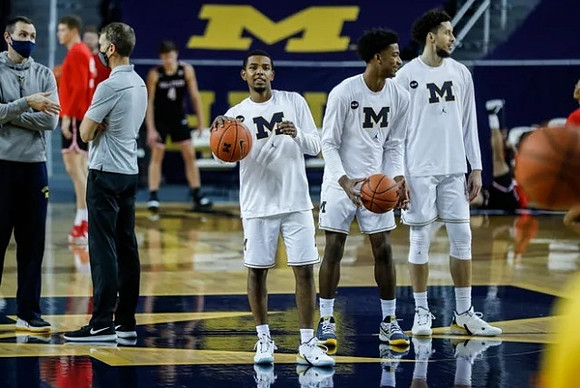 Rico Ozuna-Harrison (14), Jace Howard (25), and Brandon Johns Jr. (23)