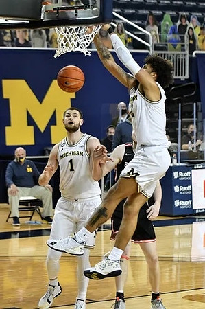 Isaiah Livers (2) and Hunter Dickinson (1)
