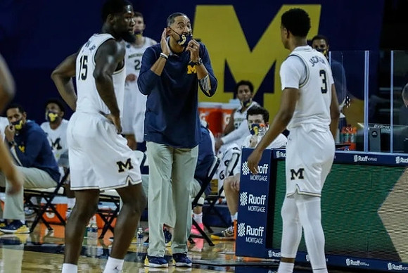 Chaundee Brown Jr. (15), Juwan Howard, and Zeb Jackson (3)