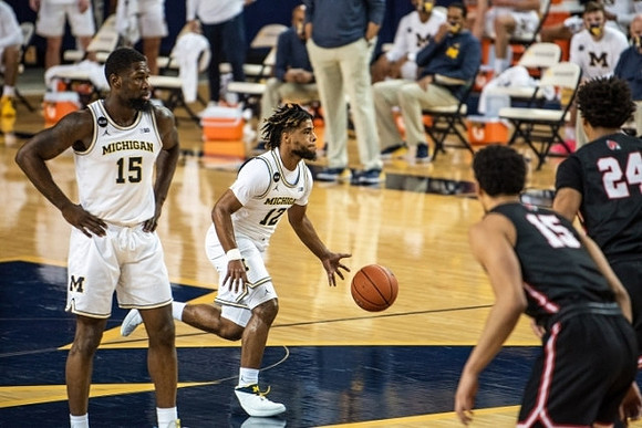 Chaundee Brown Jr. (15) and Mike Smith (12)