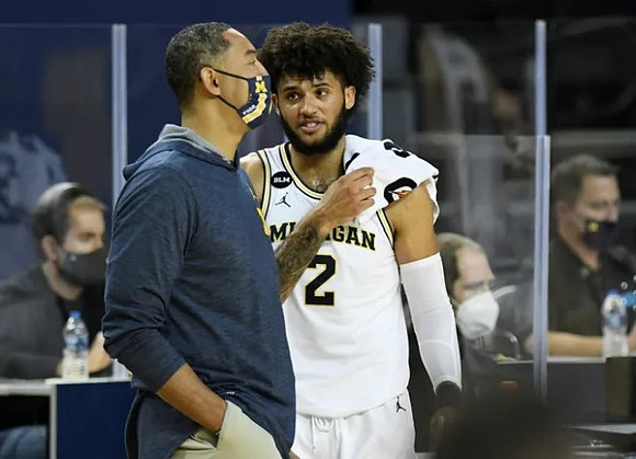 Juwan Howard and Isaiah Livers (2)