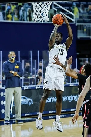 Chaundee Brown Jr. (15) and Juwan Howard