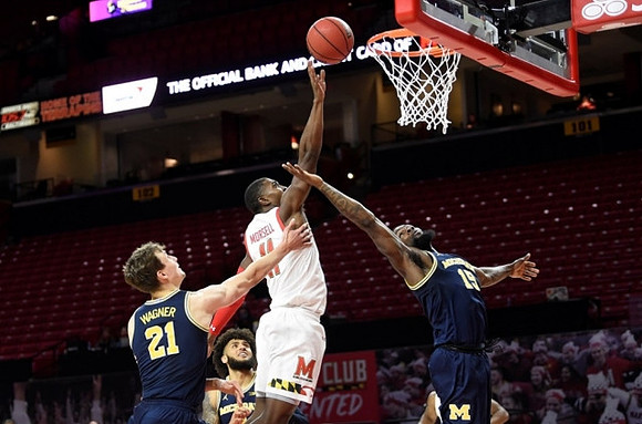 Franz Wagner (21), Isaiah Livers (2), and Chaundee Brown Jr. (15)