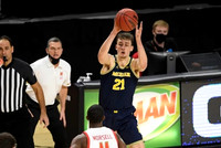 Franz Wagner (21) and Maryland Head Coach Mark Turgeon