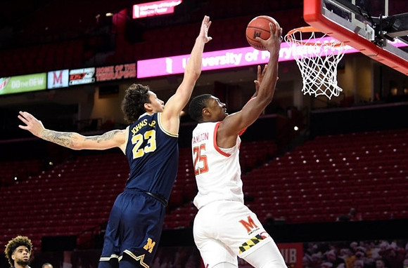 Mike Smith (12) and Brandon Johns Jr. (23)