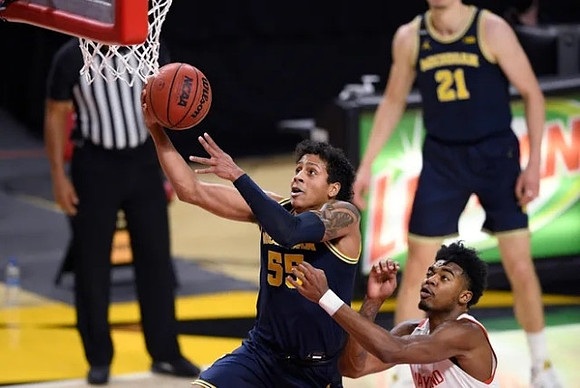 Eli Brooks (55) and Franz Wagner (21)