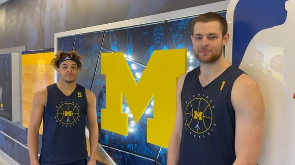 Terrance Williams II (5) and Hunter Dickinson (1)